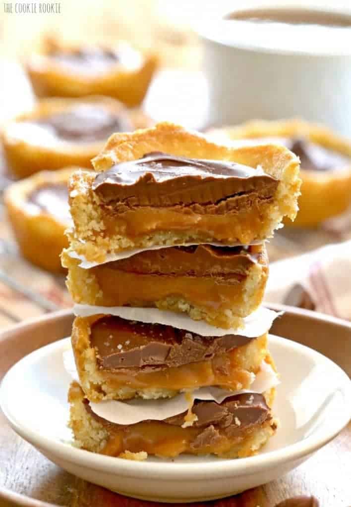 Twix Cookie Cups. AMAZING. Sugar Cookie Crust, salted caramel center, and topped with milk chocolate. BEST COOKIE RECIPE EVER! | The Cookie Rookie
